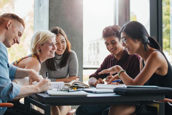 university student sitting at a table